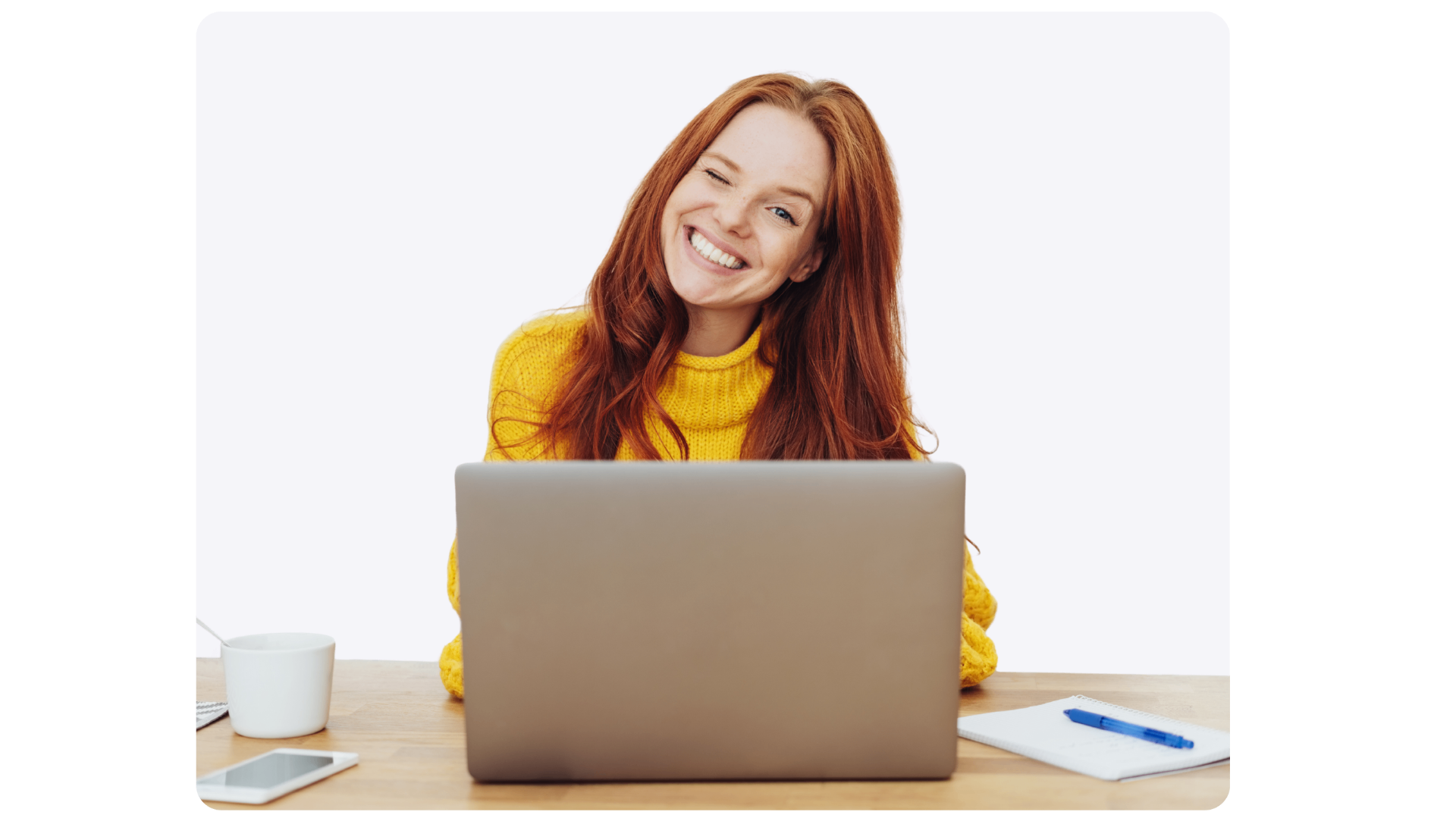 Woman working on laptop at AI marketing workshop